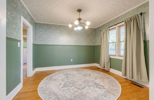 dining room, hardwood flooring, windows, chandelier