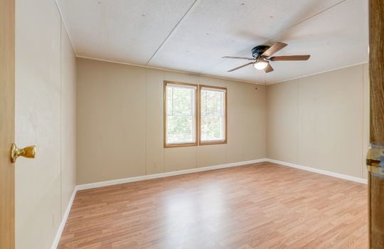 bedroom, laminate flooring, ceiling fan, windows