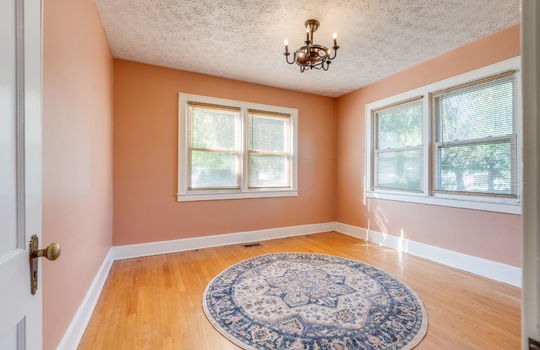 bedroom, hardwood flooring, closet, windows