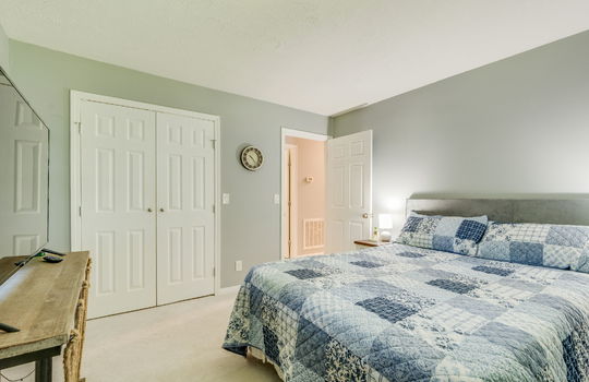 second bedroom, carpet, closet, door to hallway