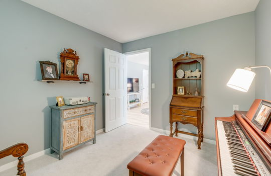 third bedroom, carpet, door to living room