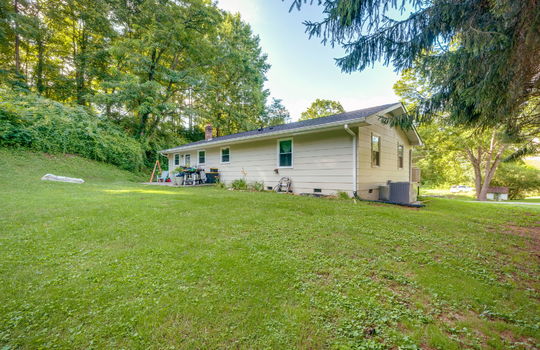 back of home, ranch home, masonite finish, back patio, back yard