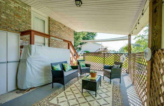 back porch, concrete pad, covered back porch, stairs to back door