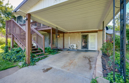 carport, exterior doors, stairs to back porch
