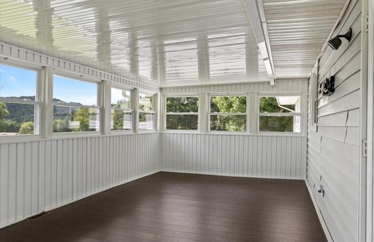 sun room, windows, luxury vinyl flooring