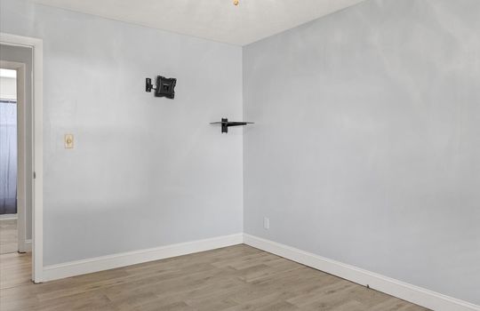 bedroom, luxury vinyl flooring, tv mount