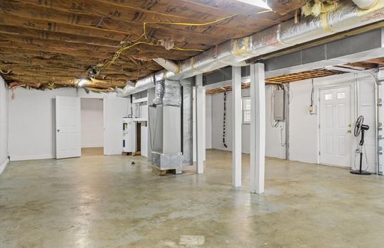 30-garage space, concrete flooring, exterior door, door to bonus space