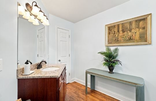 third bedroom ensuite bathroom, hardwood flooring, linen closet