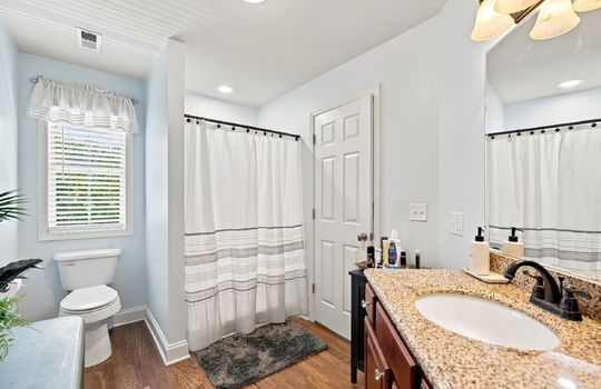 third bedroom ensuite bathroom, sink, shower, toilet
