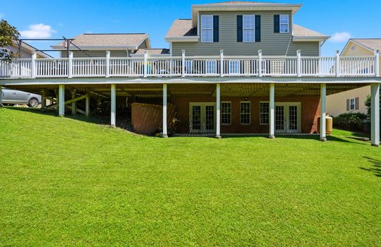 back of home, brick, vinyl siding, back deck, yard, exterior entry doors, shingle roof