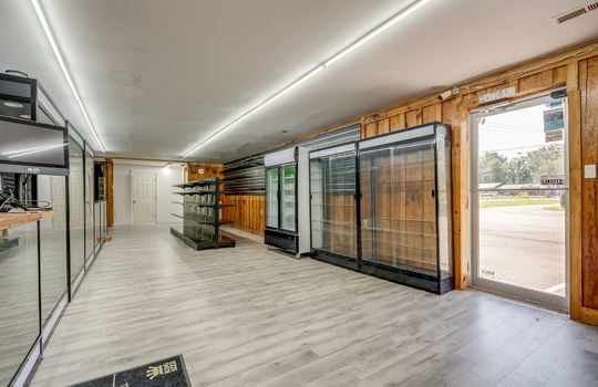 main area, display cases, refrigeration equipment, vinyl siding, glass entry door