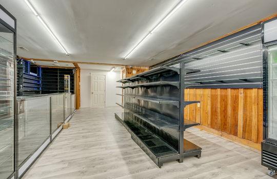 glass display cases, shelving, vinyl flooring
