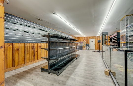 vinyl flooring, shelving, glass display cases