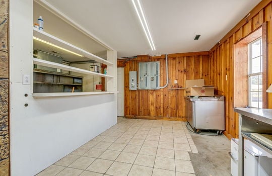 kitchen area, kitchen prep area, tile flooring, paneling walls,