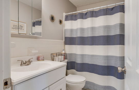 full bathroom, sink, toilet, tub/shower, tile flooring