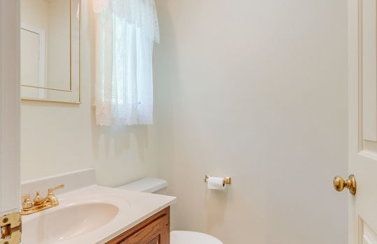half bath, toilet, sink
