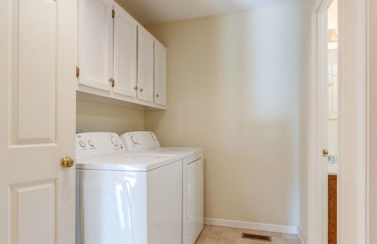 laundry room, electric dryer hookup, water hookup, cabinetry
