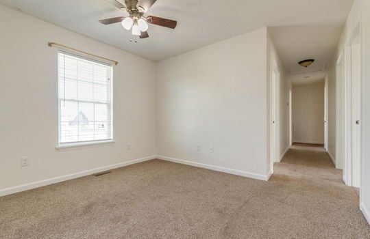 bedroom, carpet, ceiling fan, window