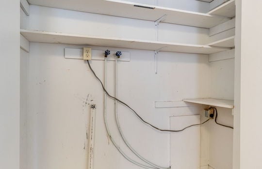 laundry closet, shelving, washer/dryer hookup