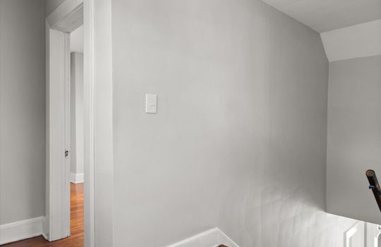 upper level landing, stairs, doors to bedrooms