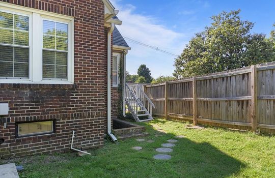 back of home, brick, side porch, back yard, fencing