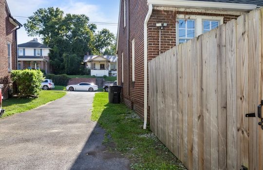 driveway, shared driveway, fencing, brick exterior