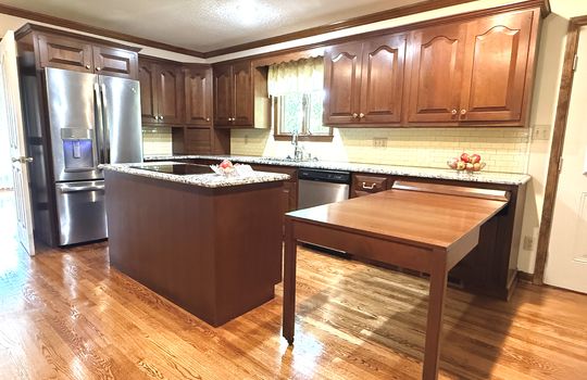 pull out peninsula table, hardwood flooring, kitchen, kitchen island