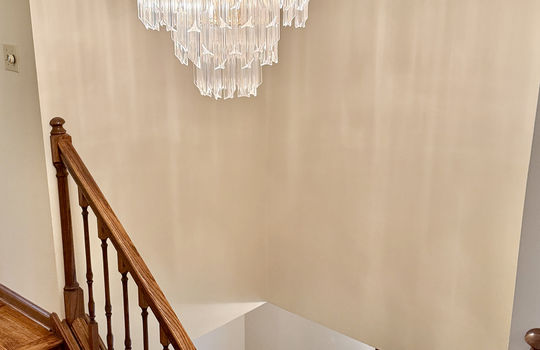 stairwell, wooden stairs, chandelier