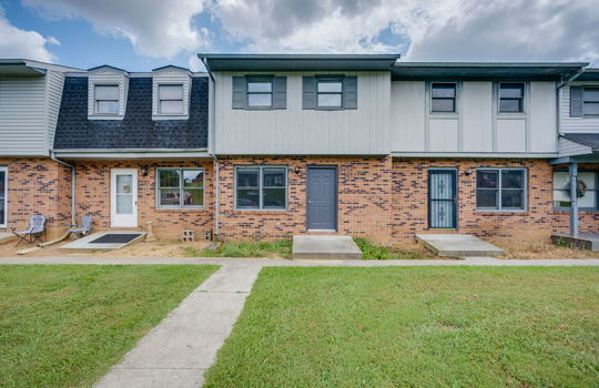 townhouse, stoop, sidewalk, brick, wood siding, window, lawn