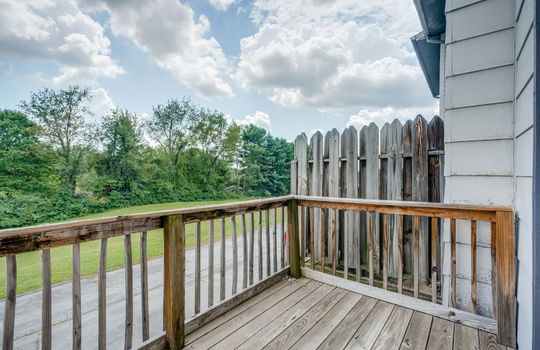 back balcony, wood siding, wood balcony, wood railings