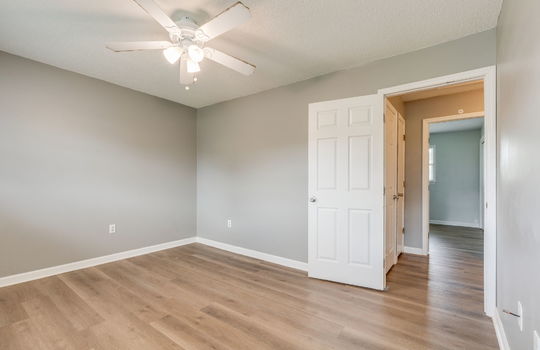 bedroom, ceiling fan, vinyl flooring