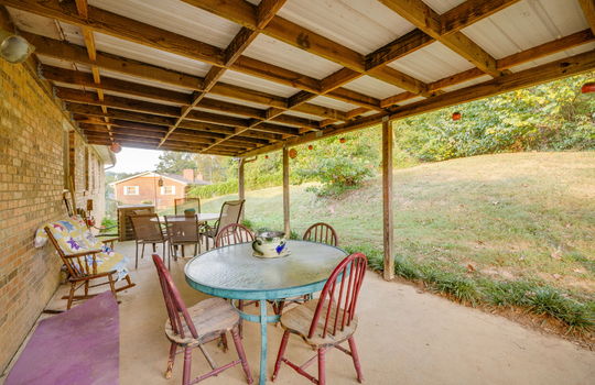 covered back patio, back yard, brick exterior