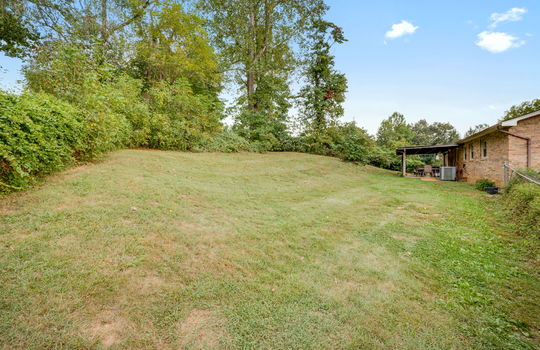 back yard, back of home, trees, back patio, brick exterior