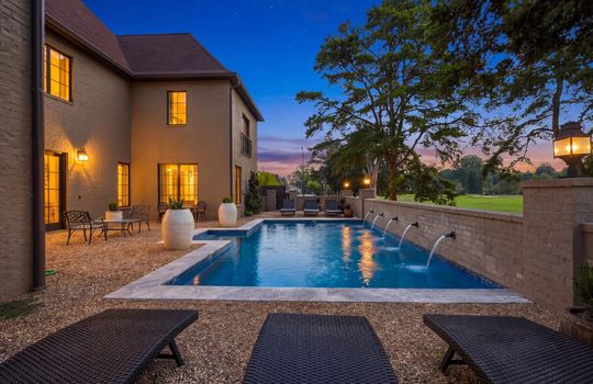 Pool, back yard, pool, heated in-ground pool, landscaping, brick exterior,