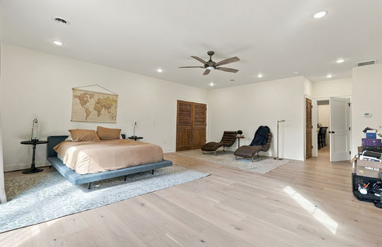 bedroom, closet, ceiling fan, recessed lighting, hardwood flooring