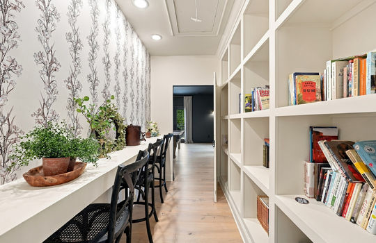 built-in shelving, bulit-in countertop, hardwood flooring, recessed lighting