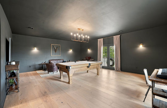 gamer room, hardwood flooring, balcony doors