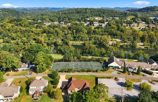 aerial view of home, neighboring homes, golf course, Ridgefields Golf Course, Mountain Views, golf course club house, tennis courts