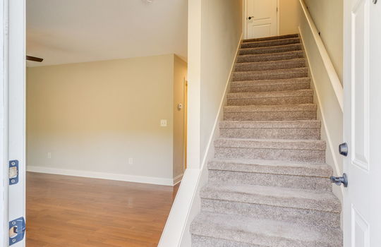 foyer/entryway, stairs, living room