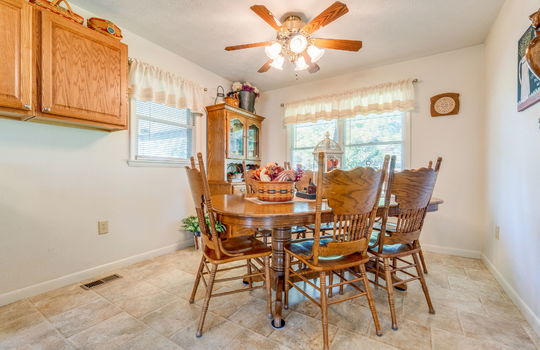 dining area, cabinets, ceiling fan, windows