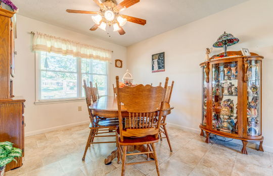 dining area, ceiling fan, windows, laminate flooring
