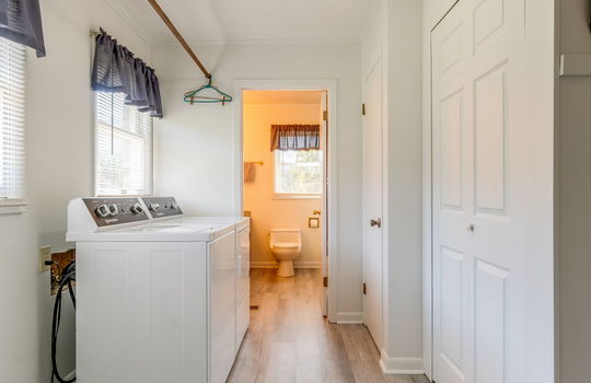 laundry space, washer/dryer hookups, doorway to bathroom