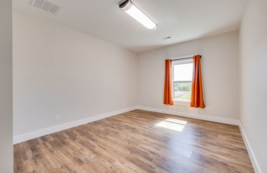 second bedroom, window, luxury vinyl flooring