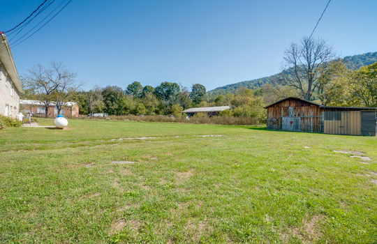 back yard, shed, mountain views, neighboring homes