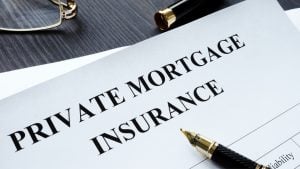 printed text private mortgage insurance on a paper with a pen