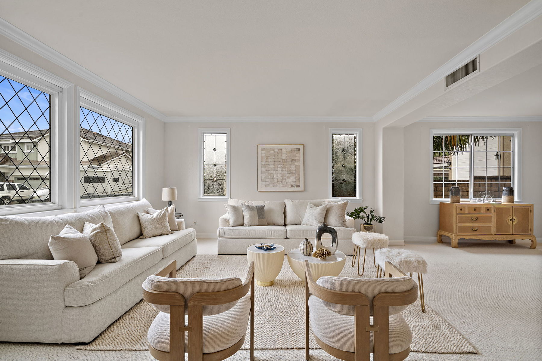 A bright, staged living room in an Orange County estate property prepared for sale.