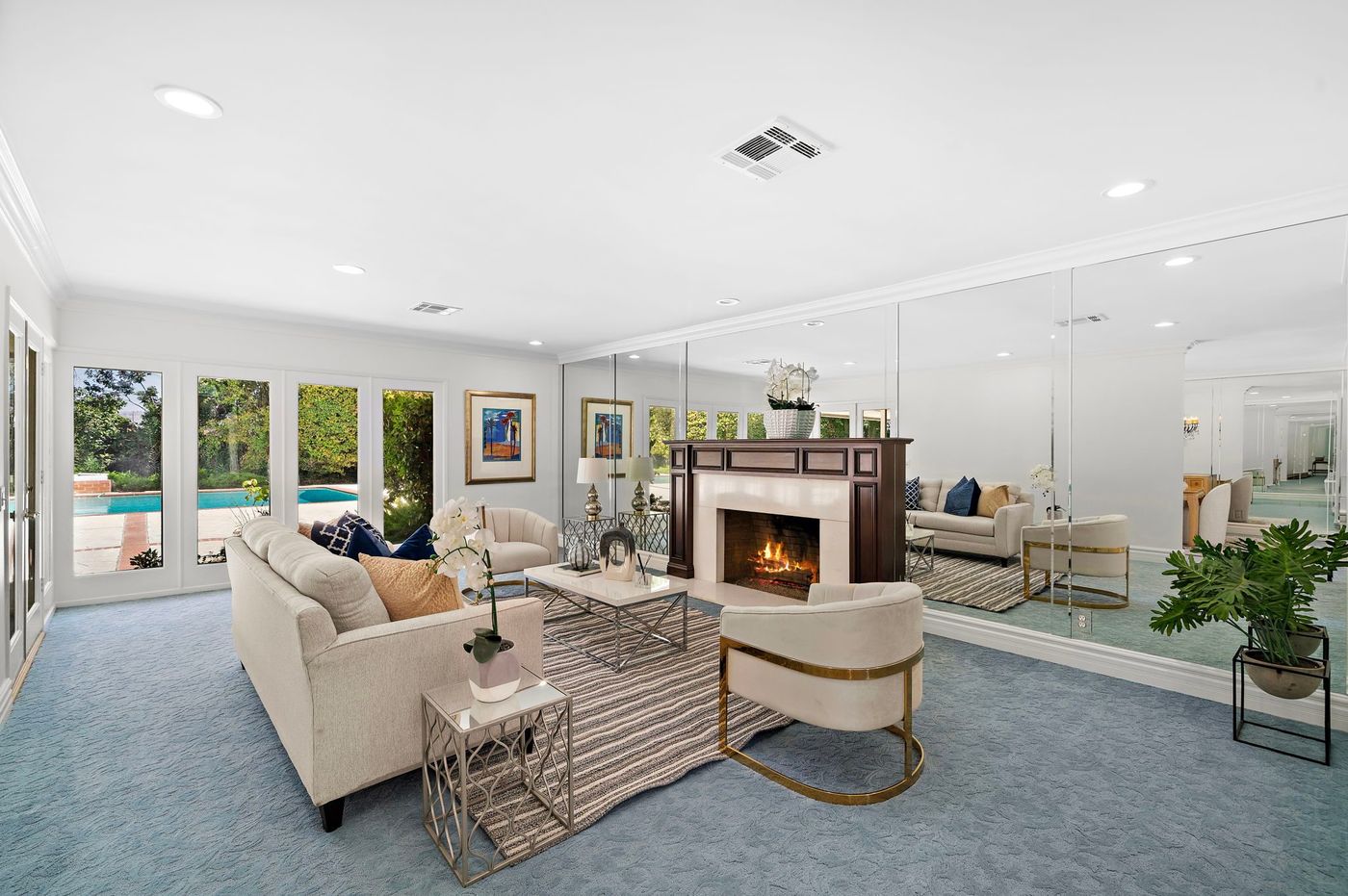 Living room with fireplace at a Brea estate sold by Aragone & Associates