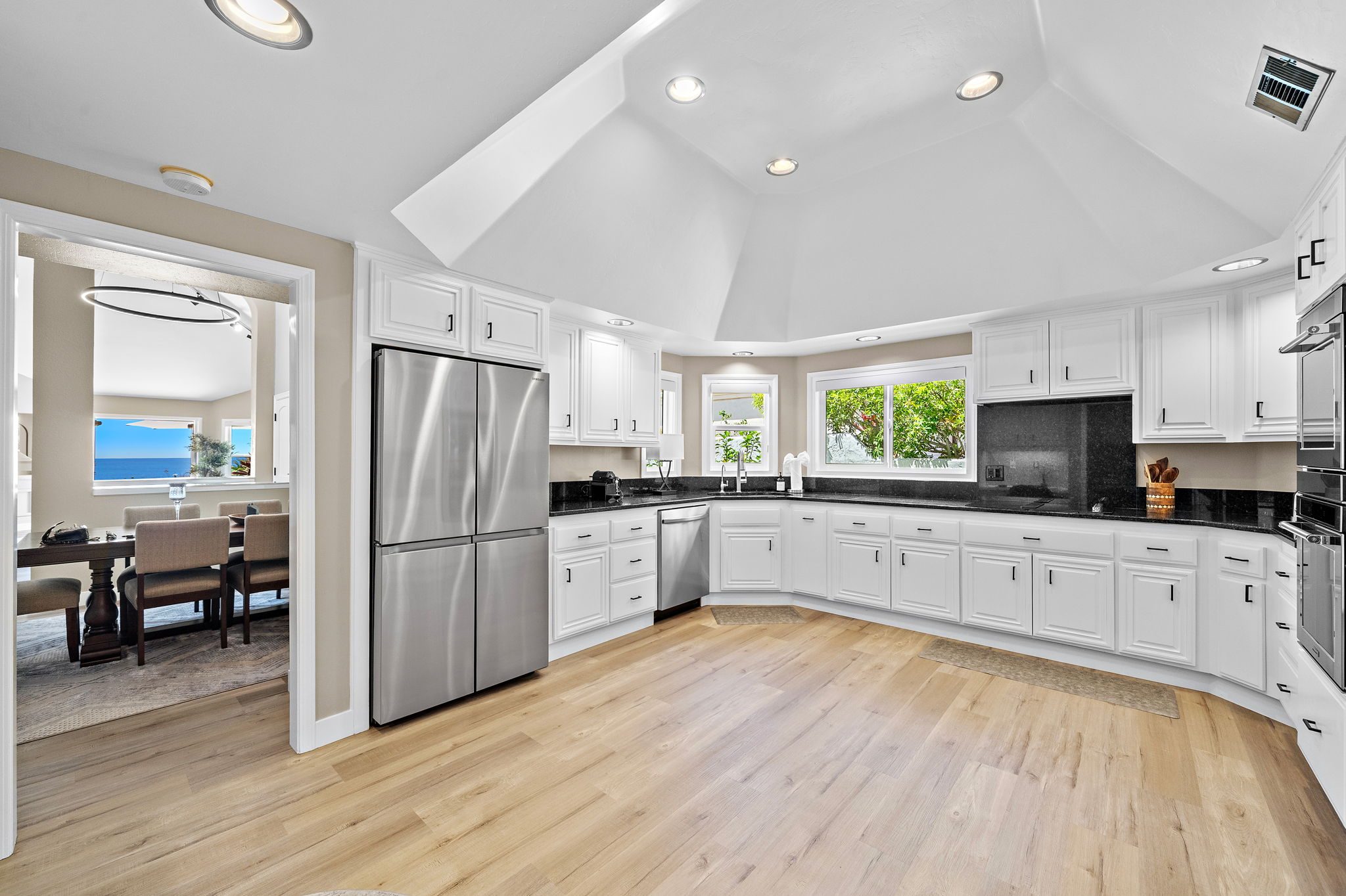 Open kitchen and living space with an ocean view in a San Clemente home