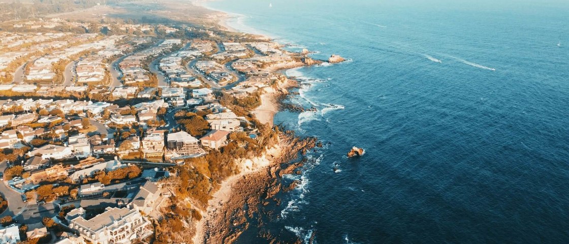 Aerial view of the Orange County coastline at golden hour