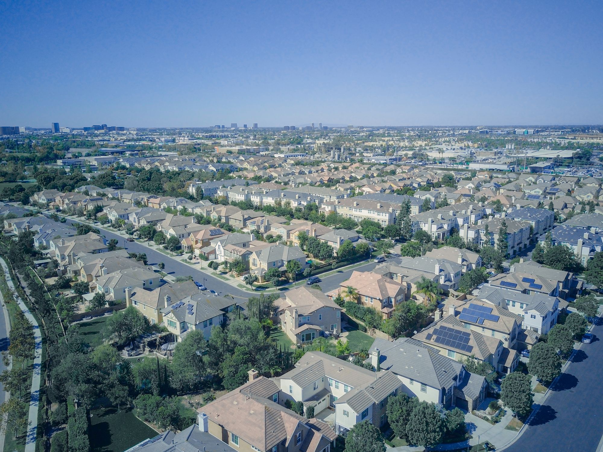 Aerial view of Southern California homes with solar panels on the roofs